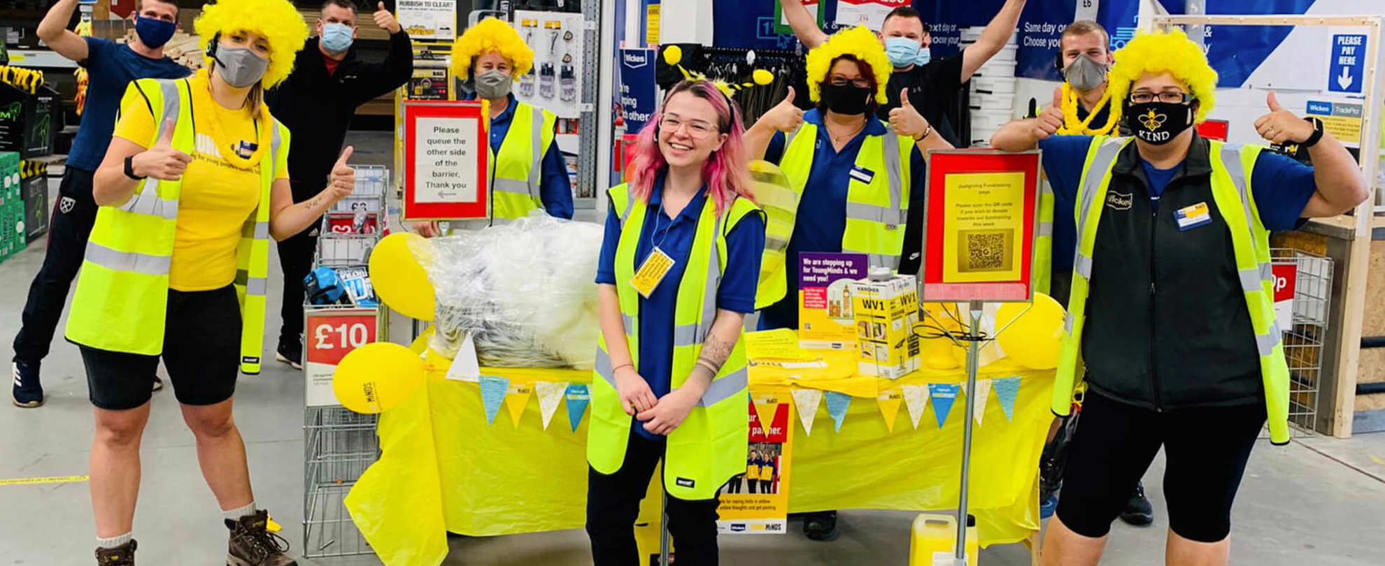 YoungMinds members with corporate partners during a fundraising event